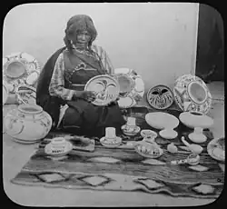 Iris Nampeyo, world-famous Hopi ceramist, with her work, c. 1900, photo by Henry Peabody