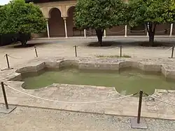 The fountain basin in the Patio de Machuca
