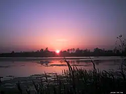 Sunset on Lake Nebunu in Periprava
