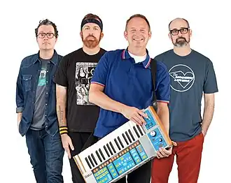 Nerf Herder in 2016 (L–R) Ben Pringle (bass); Linus of Hollywood (guitar, keyboard); Parry Gripp (vocals, guitar); Steve Sherlock (drums)