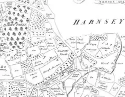 A single large house stands near a road running north–south. A small village stands to the northwest of the house, between two rivers.