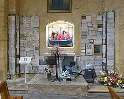 The Three Marys, in a boat and surrounded by votive offerings