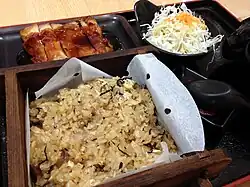 Okowa bento-styled meal (steamed glutinous rice with teriyaki chicken and cabbage) served in a restaurant