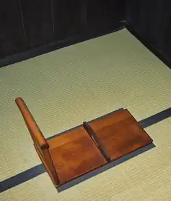 Wooden lid covering the Meiji Era squat toilet of a wealthy Japanese near Nakatsugawa