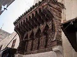 Wooden canopy over the entrance of the 14th-century Mosque of Abu al-Hasan