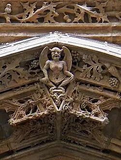 The mythical figure at the top of the west portal (19th c.)