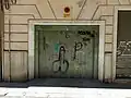 Cock and balls graffiti on a garage door in Granada, Spain, 2015