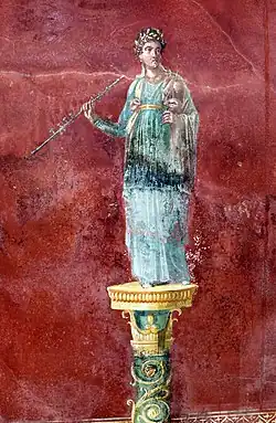 Middle of the 1st century A.D., Pompeii. Euterpe with tibiae. The reeds are visible in one of the instruments.