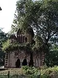 Radhanagar: Pancha ratna Gopinath temple (in picture), laterite built in 1718, at Radhanagar and Pancha ratna Singhabahini temple at Nabagram, built in 1709, with exquisite terracotta carvings, both endangered.