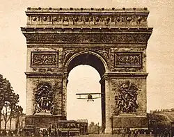 Charles Godefroy flying through the Arc de Triomphe in 1919.