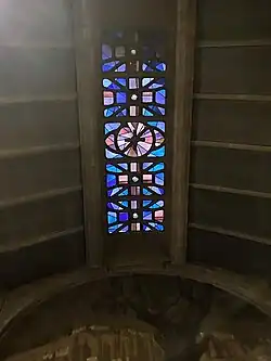 Glass in ceiling vault over the collateral aisle