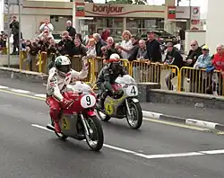 Giacomo Agostini (9) MV Agusta 500c John McGuinness 500cc Honda - Classic TT Parliament Square, Ramsey 24 August 2013