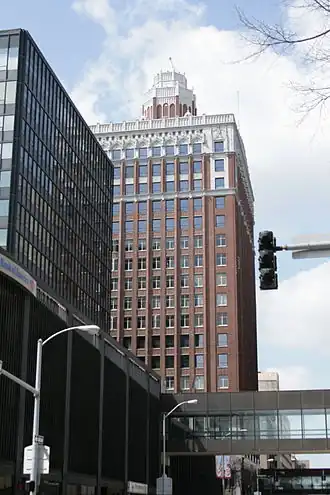 Photograph of the Equitable Building, a downtown, high-rise office building with a Gothic cupola penthouse