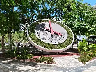 Floral clock with faces of famous past citizens of Caguas