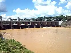 Polgolla barrage as seen from the downstream when the Victoria reservoir has reached full capacity and has inundated a portion of the barrage.