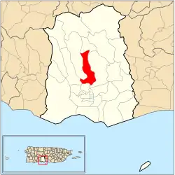 Location of barrio Portugues within the municipality of Ponce shown in red