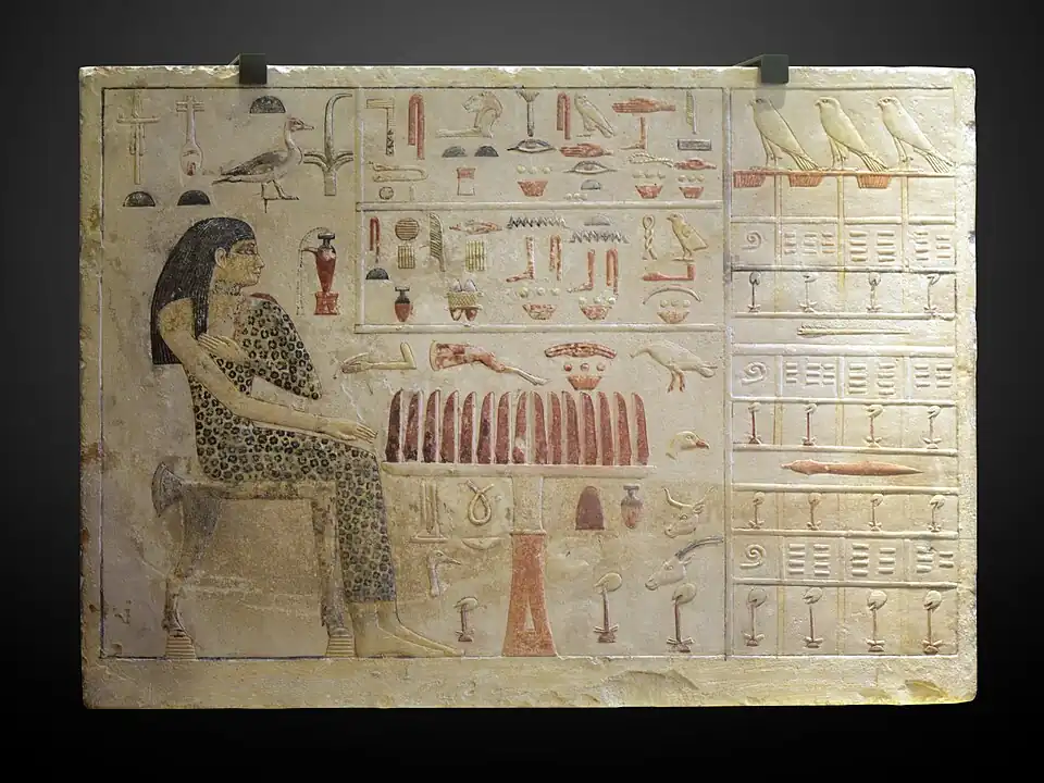 Stele of Princess Nefertiabet eating; 2589-2566 BC; limestone & paint; height: 37.7 cm (147⁄8 in.), length: 52.5 cm (205⁄8 in.), depth: 8.3 cm (31⁄4 in.); from Giza; Louvre (Paris). This finely executed relief represents the most succinct assurance of perpetual offering for the deceased.