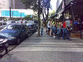 Sidewalk next to Paulista Avenue tiled with Portuguese pavement, in São Paulo, Brazil