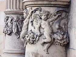 Putti on sculptural columns on the Hotel Russell facade