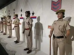 Mannequins in khaki uniforms