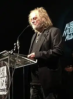 Hubbard receiving the "Songwriter of the Year" award at the 2018 Austin Music Awards