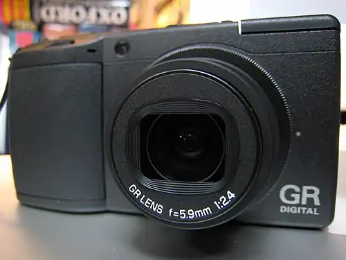 Ricoh GR Digital II with the lens protruding