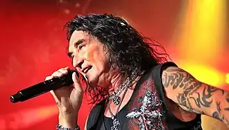 McAuley performing in 2024