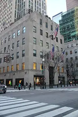 Facade of the Palazzo d'Italia, a six-story structure attached to the main tower, as seen from Fifth Avenue and 50th Street