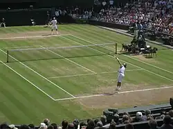 Nadal serves to Federer during the 2006 Wimbledon final