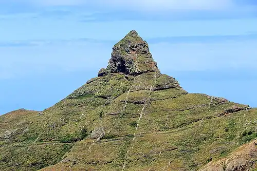 Basaltic lava flows and subordinate pyroclastic rock layers cut by vertical dykes at Roque de Taborno in the Anaga Massif on Tenerife[298][299]