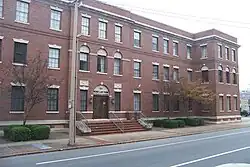 A three-story, red brick building in Arkansas. The Rose Law Firm is located inside this building. Clinton worked at Rose Law Firm for fifteen years.