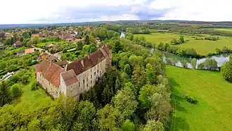 The chateau on the bank of the Ognon river, in Ruffey-le-Château
