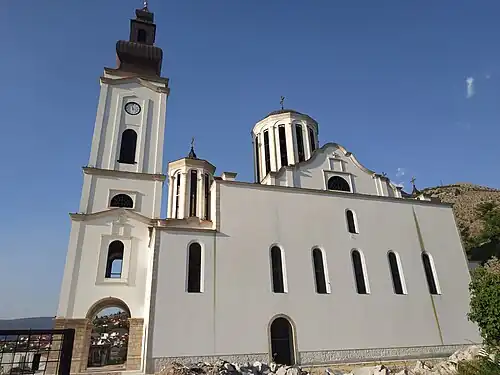 Mostar cathedral, the white church with black roof in the background, 1890-1900