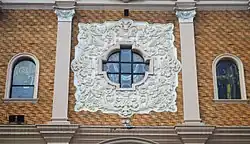 The façade relief surrounding the center window