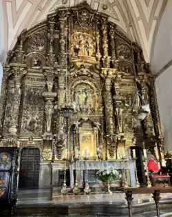 Interior altar of the Santa María church in Lluanco