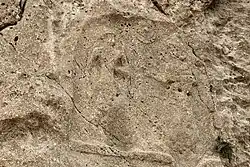 Sar-e Pol-e Zahab, relief IV. Beardless warrior trampling a foe, facing a goddess.[1]