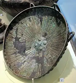 Ribbed bronze plaque cup from the Fairground burial site, grave 154, Villanovan III, 750-700 BC.