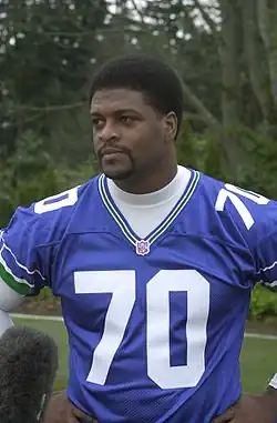 Sinclair wearing his Seahawks jersey in 2002
