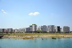 A photo of the city taken from the lake