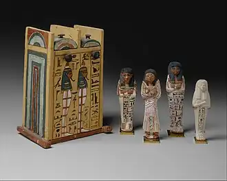 Four ushabtis of Khabekhnet and their box; 1279–1213 BC; painted limestone; height of the ushabtis: 16.7 cm; Metropolitan Museum of Art