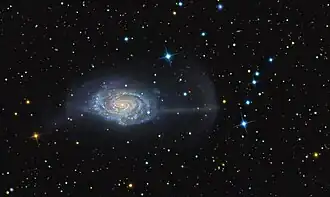 Spiral galaxy with streams of light