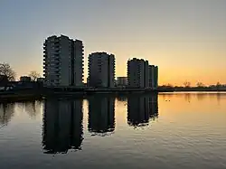 Southmere Lake with Thamesmead Blocks, Abbey Wood, SE2, London. Photo: James O'Leary