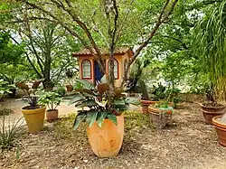 A traditional southwest style house and yard.