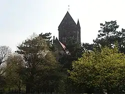 Church behind trees