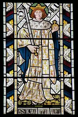 The French saint King Louis IX in the stained glass of the East window of All Saints Church, Cambridge