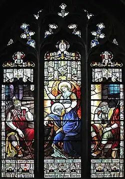 Stained-glass depiction (1920s) of St Paul the Evangelist in prison.