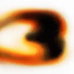 A blurry object in the shape of the number 3.