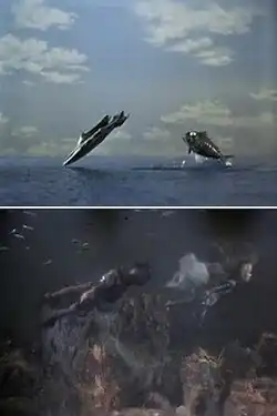 In the top image, a sleek combat submarine has propelled itself out of the ocean and is about to dive back under the water. Right behind it is a submersible resembling a giant fish, which has just cleared the water and is now in mid-air. In the bottom image, a man and a woman swim along the ocean floor. Fish can be seen in the top-left corner. While the man is wearing a wetsuit and breathing equipment, the woman is dressed only in a multi-layered cloak, which appears to be moving with the current.