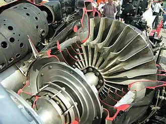 Klimov VK-1 early subsonic inlet showing the curved turning vanes which guide the inlet air into the eye of the impeller front and rear. This performance improvement was introduced by Frank Whittle in 1939 for the Power Jets W.1A "to help the air round the corner".[102] The equivalent vanes on the Rolls-Royce Nene reduced the inlet losses to the extent that thrust was increased from 4,000 to 5,000 lb at the same turbine temperature.[103]