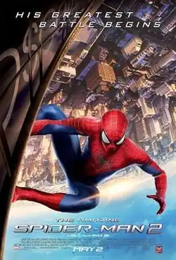 Spider-Man upside down on the side of the Oscorp tower with the film's title, credits and release date underneath below.